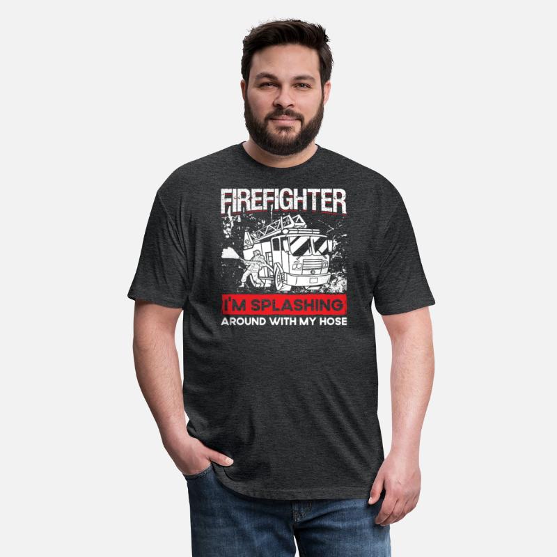 Firefighter splashing around fireman firetruck