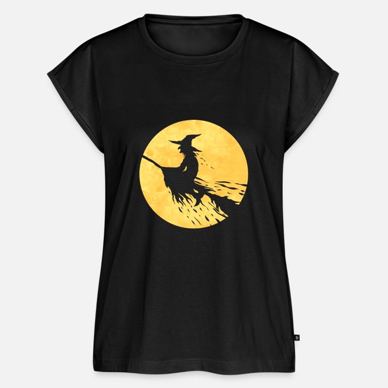 Witch On A Broom Flying In Front Of The Moon On